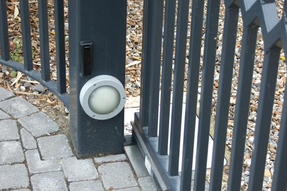 Concealed gate automation